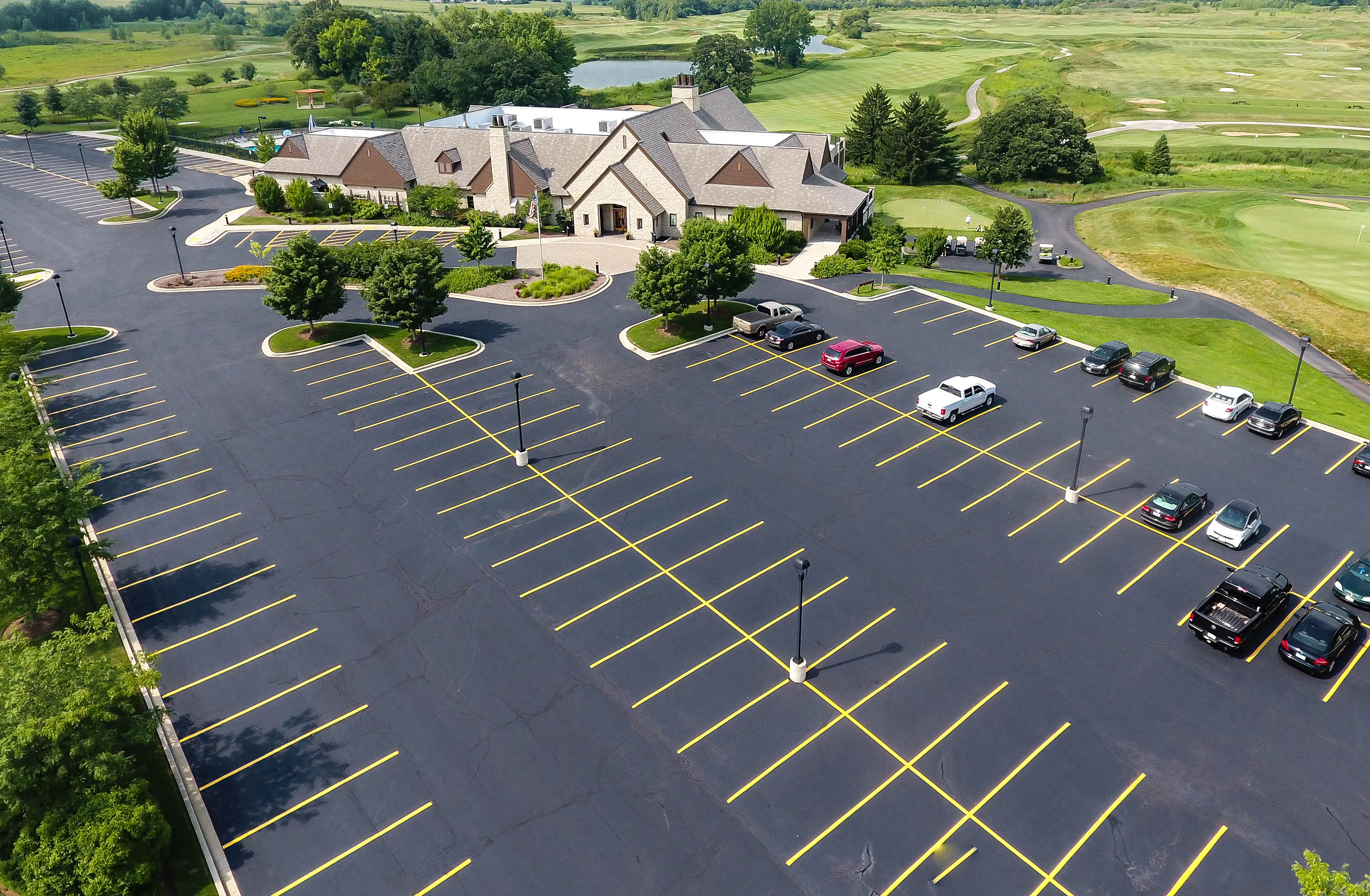 Ariel view of a freshly paved church parking lot