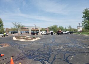 Unpaved retail parking lot