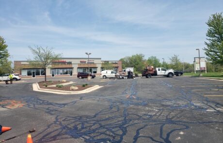 Unpaved retail parking lot